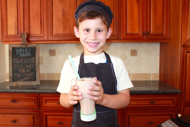 chocolate coconut milk smoothie with boy