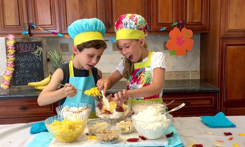 hawaiian trifle kids adding pineapple