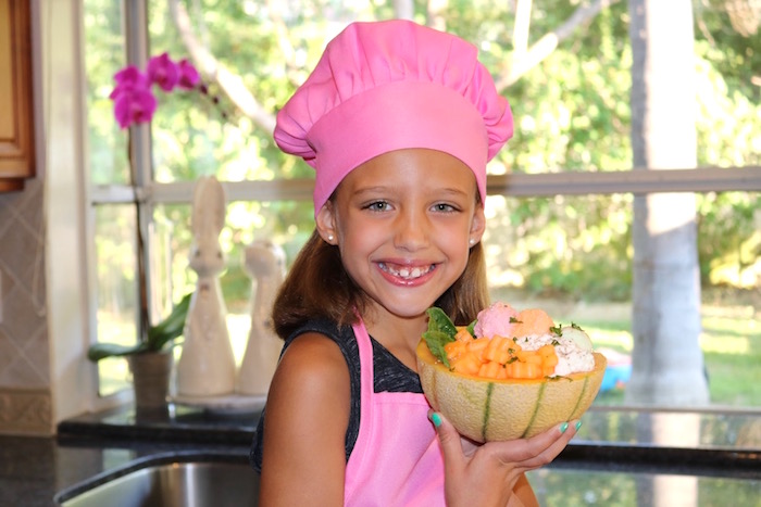 cantaloupe treat bowl with girl