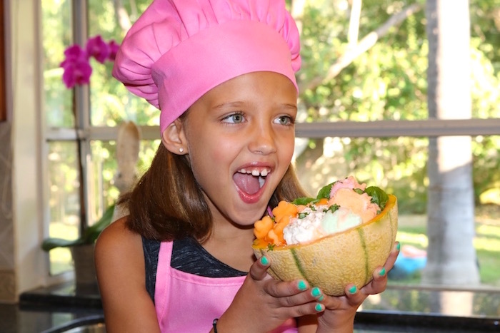 cantaloupe treat bowl girl holding bowl