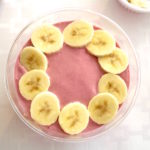 raspberry smoothie bowl with banana slices