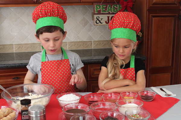 kids in the kitchen making cannolis