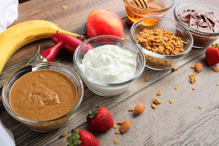 apple snacks ingredients in glass bowls