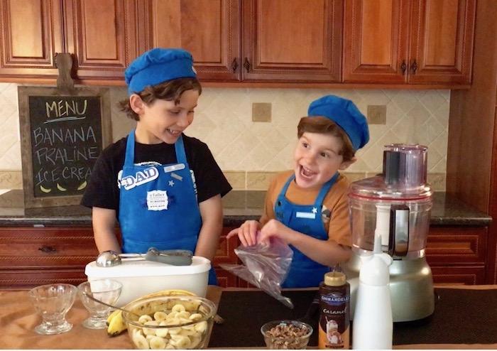 boys-laughing making banana ice cream