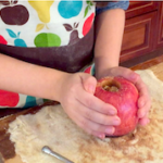 caramel apple dumpling childs hands on apple