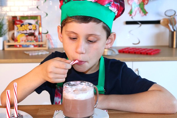 candy cane cocoa recipe boy eating candy