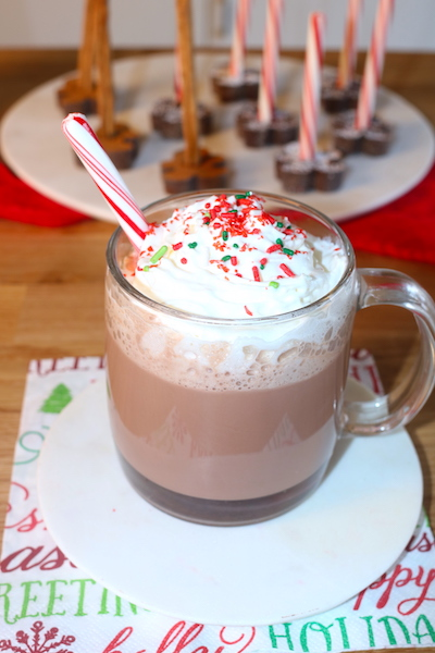 peppermint hot chocolate with candy cane stirrers ready to drink