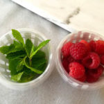 raspberry and mint in baskets