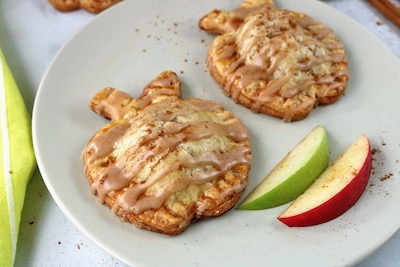 tn apple shaped hand pies with apples on plate