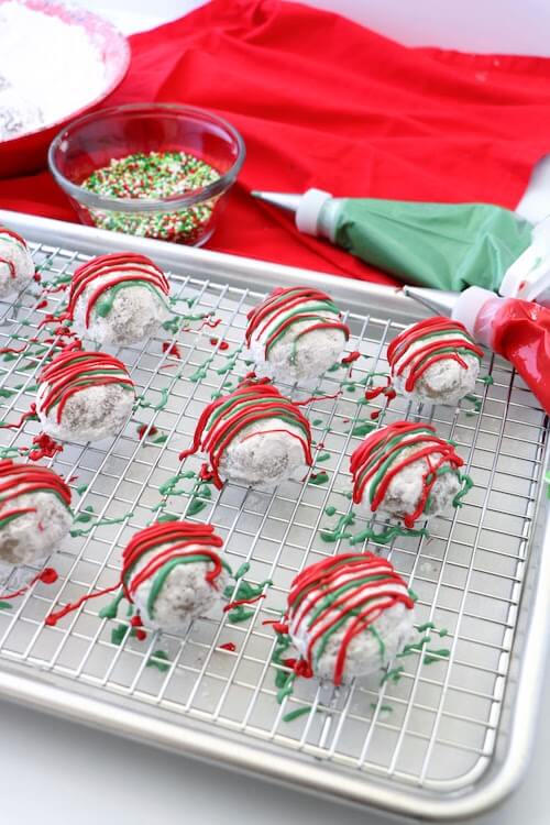 snowball cookies decorated with candy melts