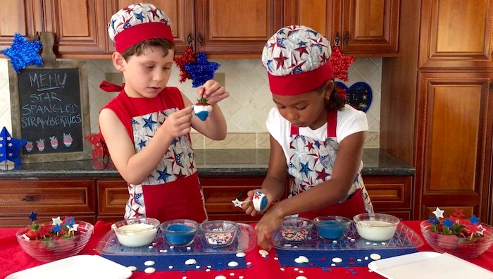stars spangled strawberries dipping in chocolate