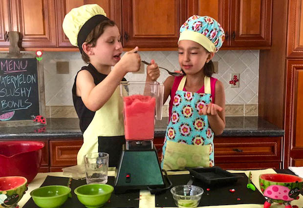 watermelon slushy bowl with kids eating