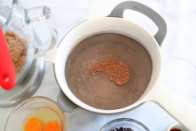 sifted ingredients for chocolate snowball cookies