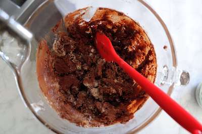 chocolate snowball cookies in mixer