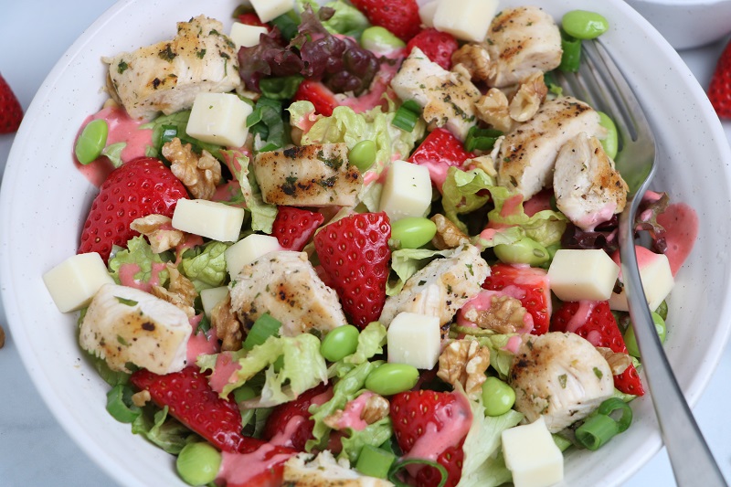 healthy chicken and strawberry salad portrait 