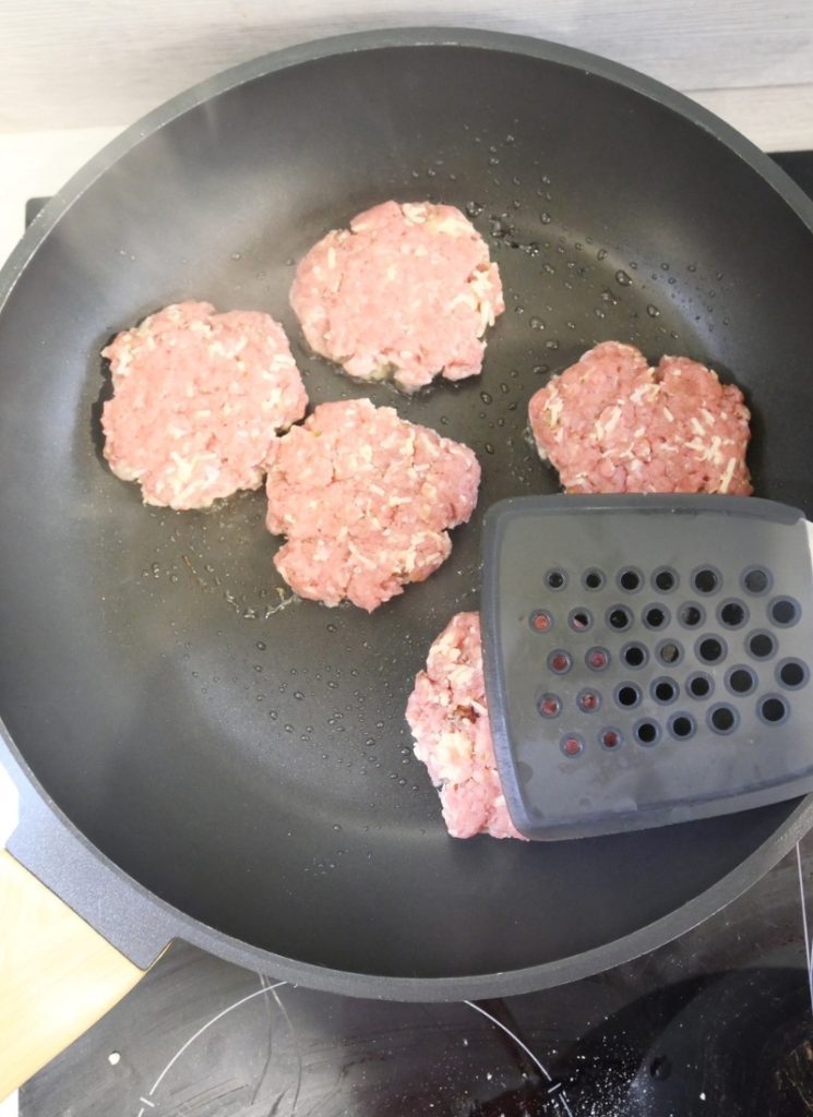 cooking the turkey burger patties in the skillet or pan and smashing them down with a spatula
