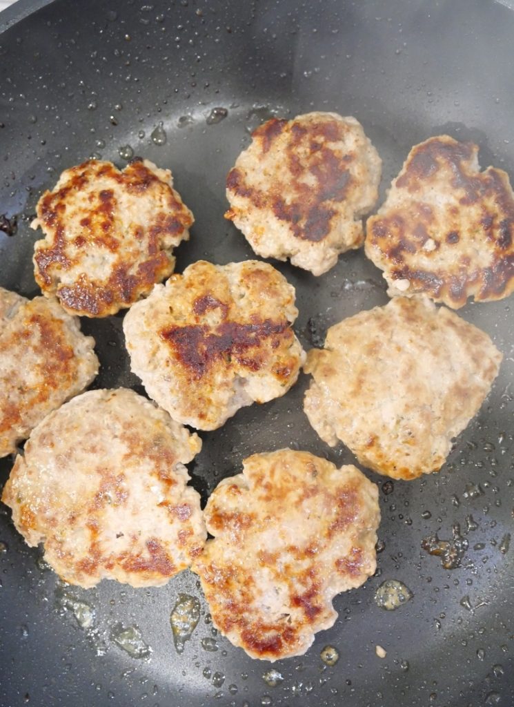 turkey burger patties flipped and ready for cheese