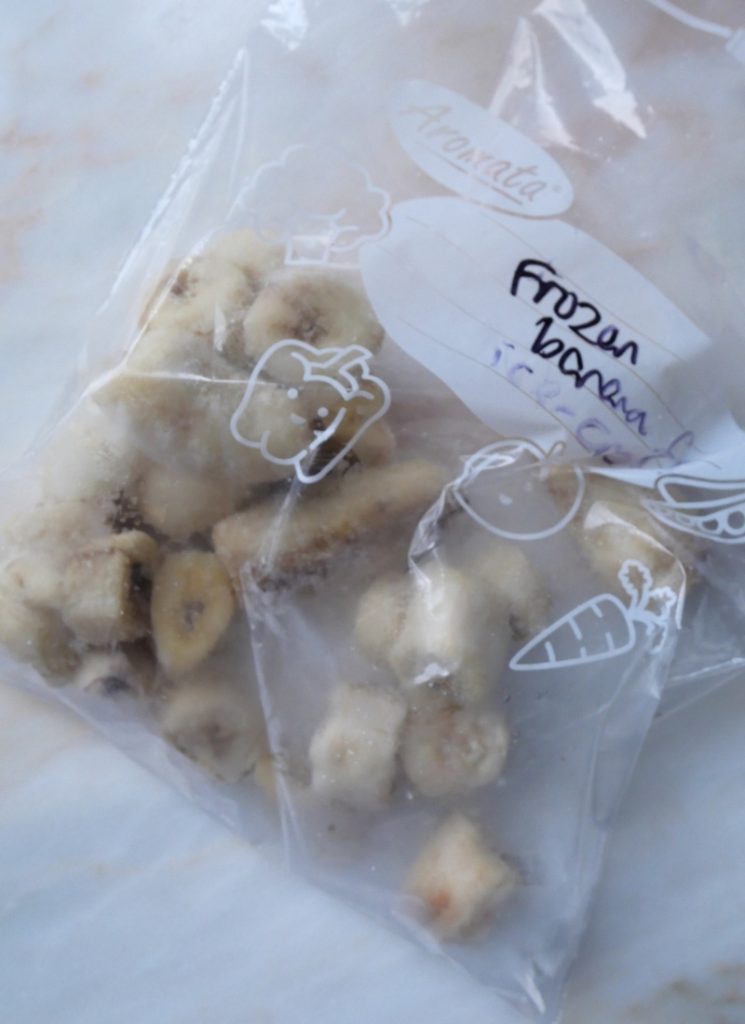 freezing bananas for smoothies and ice-cream by peeling and slicing