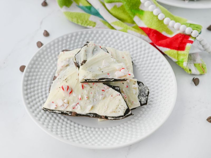 chocolate peppermint bark with Oreos and candy cane finished - angled front view in horizontal