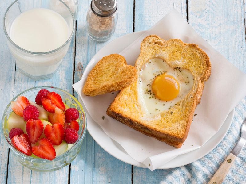 heart shaped sunny side up in toasted bread